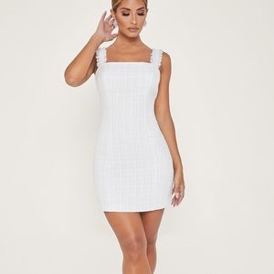 A white tweed Meshki dress